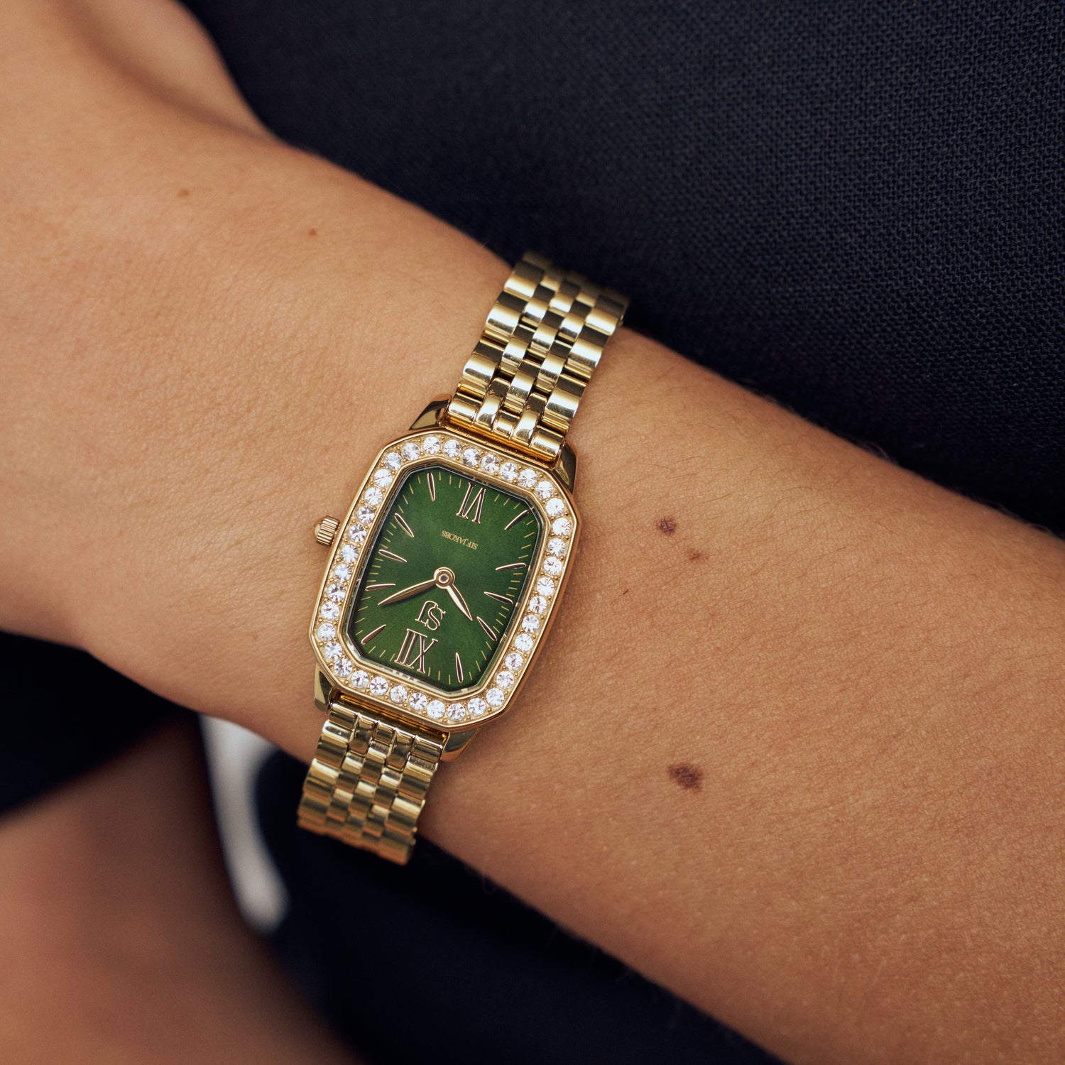 Stainless steel gold | Green dial and white zirconia